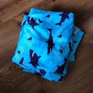 Highlight’s blue shark curtain panel